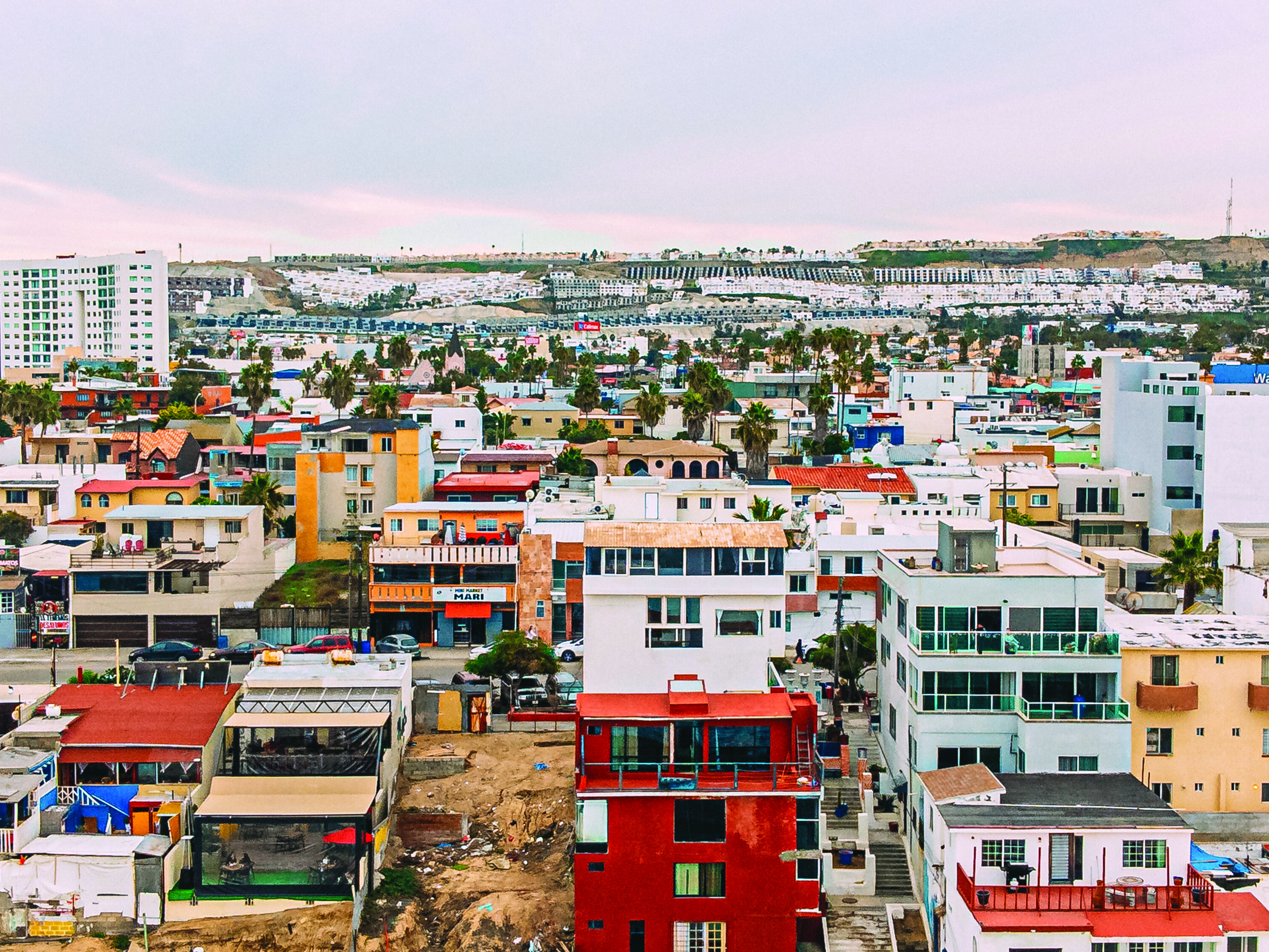 looking east: high angle view of homes and bnbs off the coast of tijuana, mexico on an overcast day