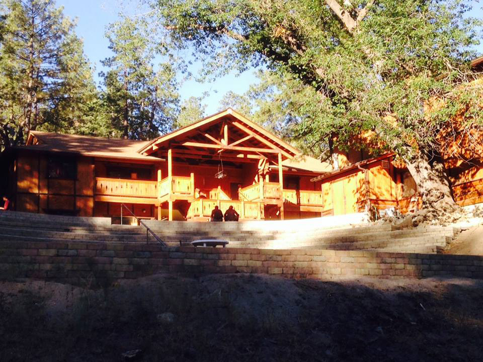 Rustic cabin with front porch and stairs